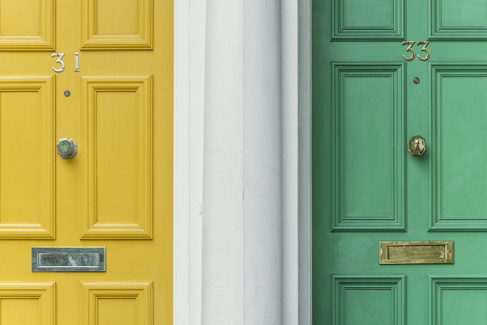 yellow door and green door side by side