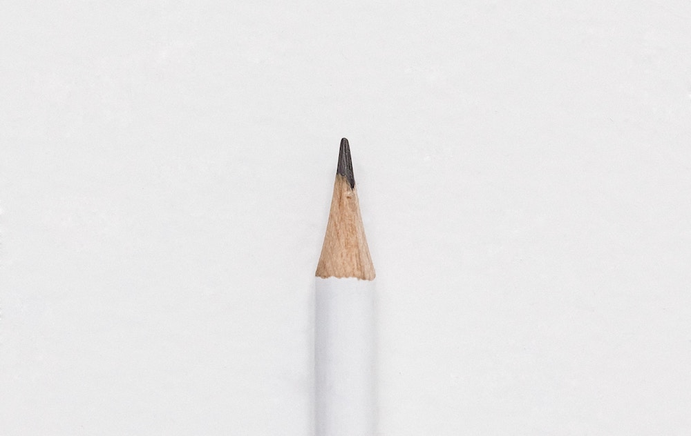 ow to choose word of the year - pencil on a white background