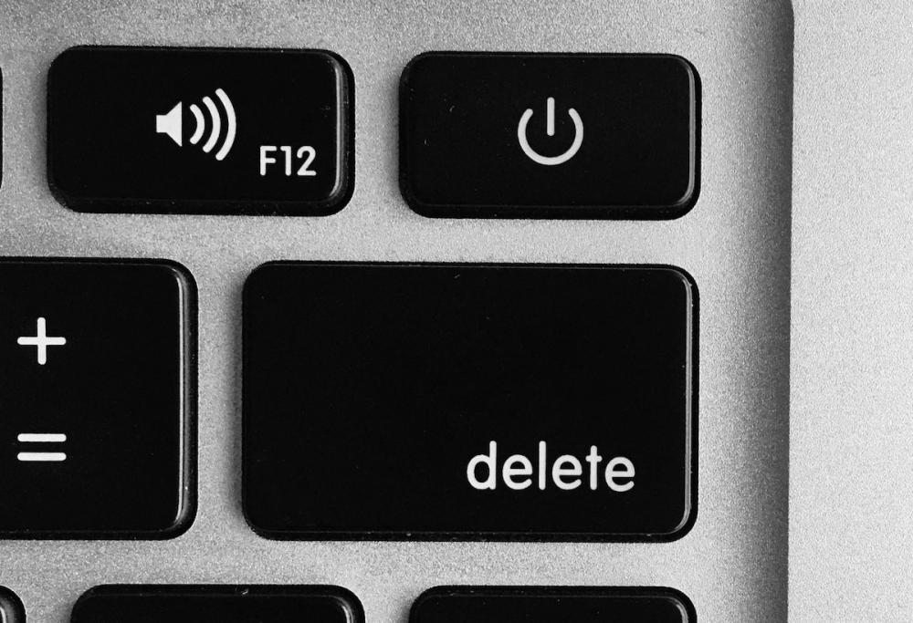 am I making the right decision? close up of the delete button on a computer keyboard