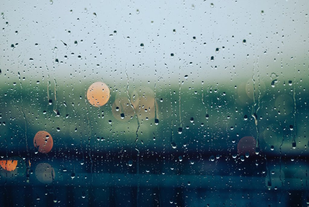 how to turn around a bad day: a rainy day outside of a window