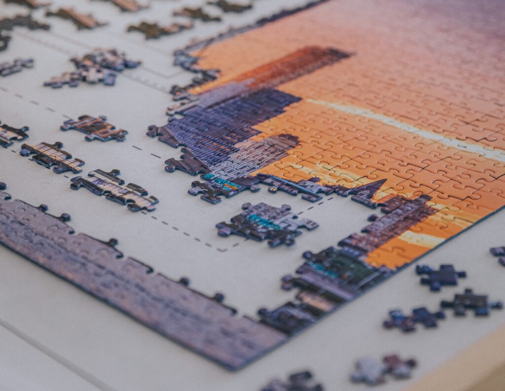 benefits of doing jigsaw puzzles: the corner of a jigsaw puzzle in progress