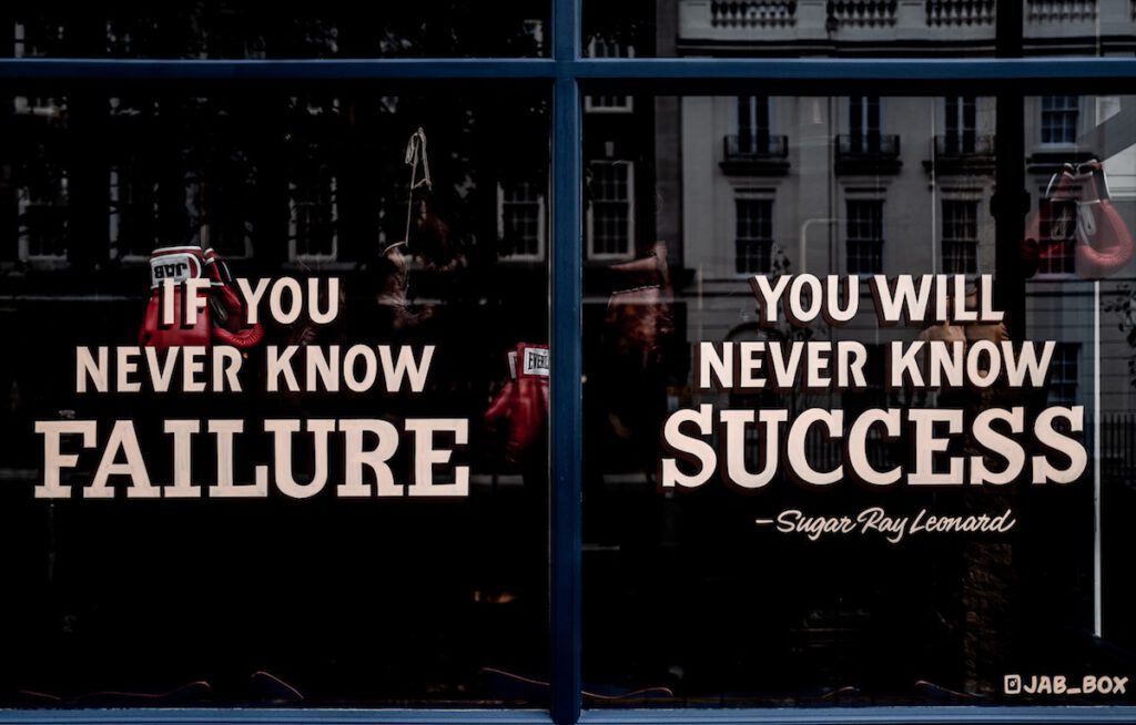 quote on the window of a boxing studio