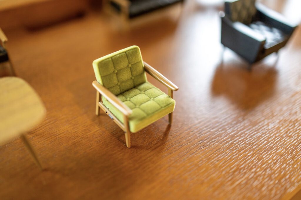 little things in business - a miniature green office chair