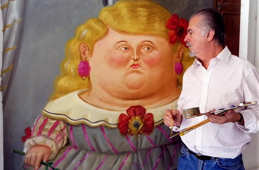 Fernando Botero with a painting