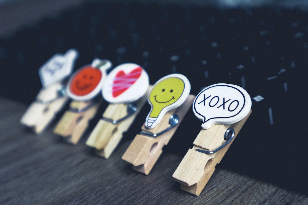  how to get likes - emojis on clothes pins ways to increase engagement on social media