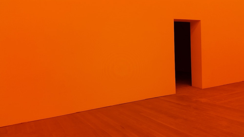 an orange room with doorway