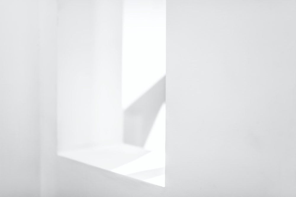 white window in a white room