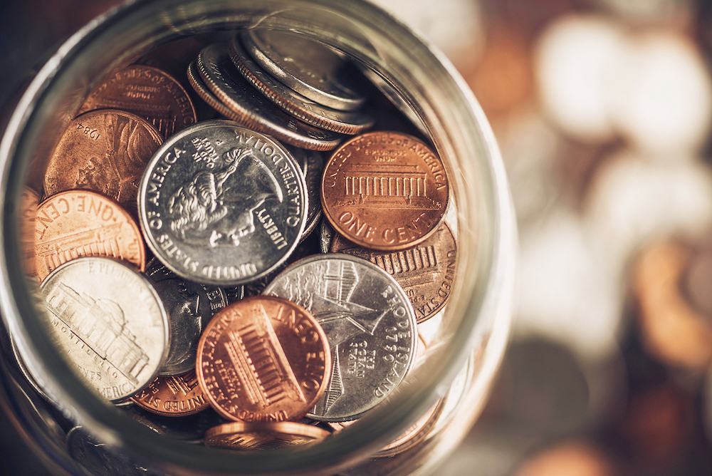 glass jar full of coins