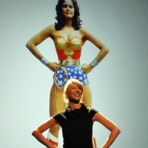 amy cuddy wonder woman poster power pose standing strong with arms crossed