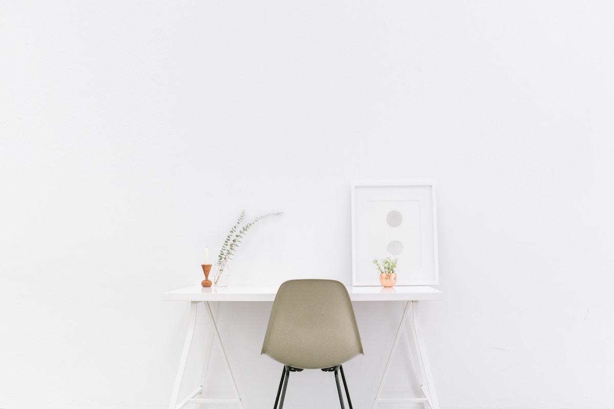 declutter your life minimalist chair and desk in a room