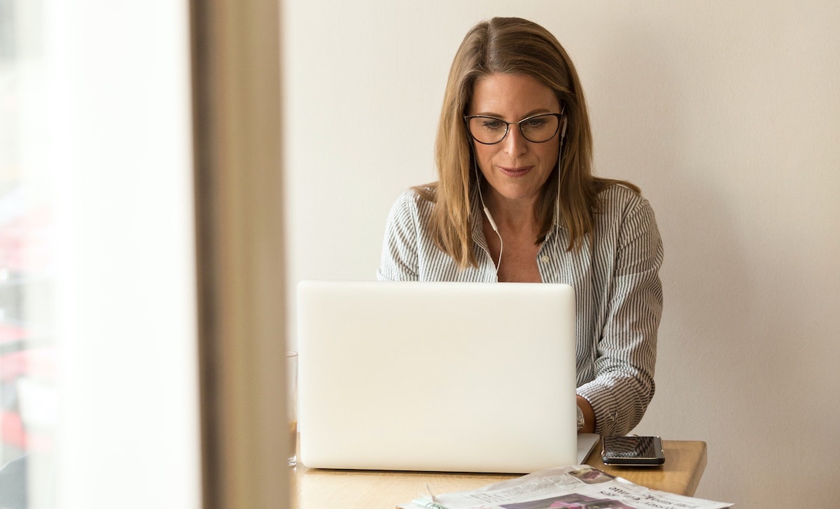 woman focused at computer