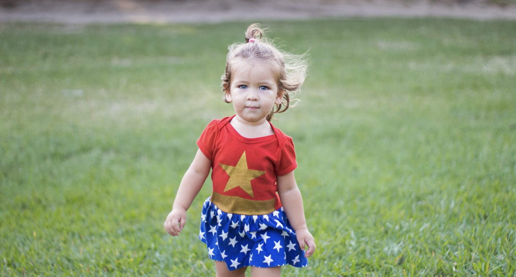 little girl dressed up as wonder woman