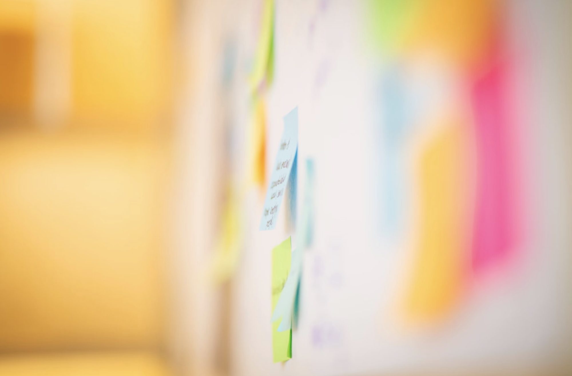 post-it notes on a board