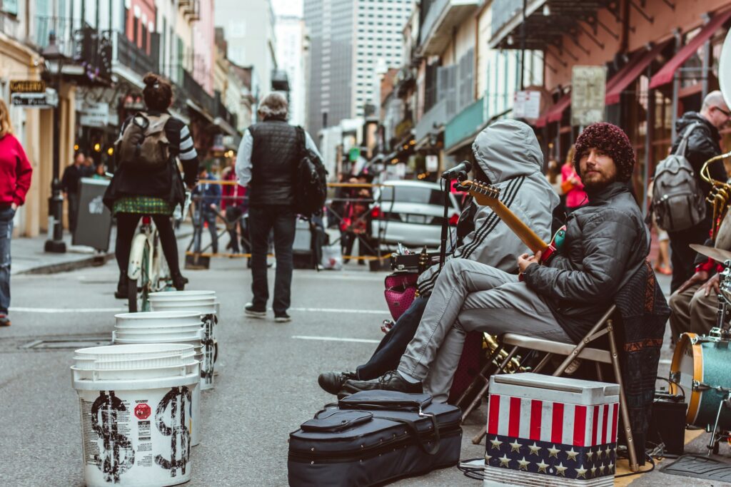 street musicians performing on a busy street